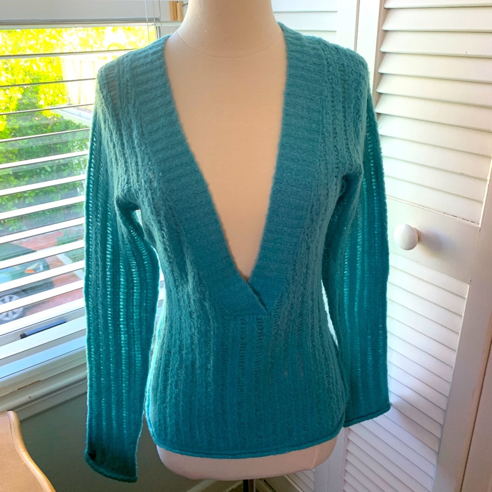 Energie sweater size large in a turquoise color.
